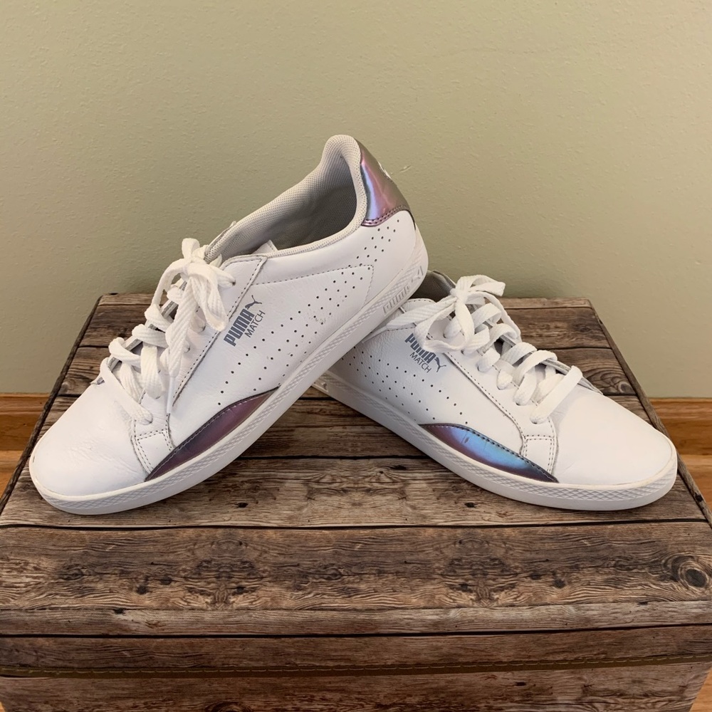 White & purple Puma athletic shoes